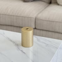 حامل شمع معدن ذهبي