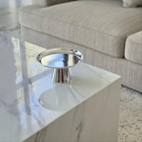 تقديمة معدن فضي