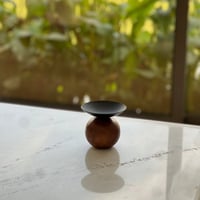 تقديمة حديد بقاعدة خشب