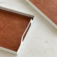 صينية حديد بطبقة جلد