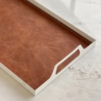 صينية حديد بطبقة جلد