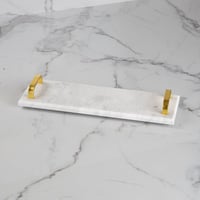 تقديمة رخام بمقابض ذهبية