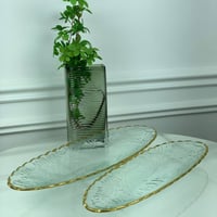 صحن تقديم زجاجي باطراف ذهبية