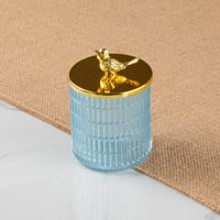 علبة زجاج بغطاء ذهبي