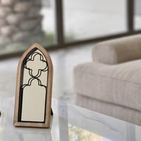 مرايا بحواف خشبية