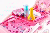 دمية مع سرير درزن