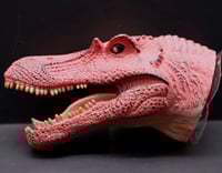 العاب يد مجسم راس ديناصور