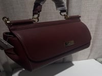 شنطة دولتشي اند غابانا شامل الملحقات كبير