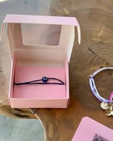 إسورة خيط باللون الكحلي