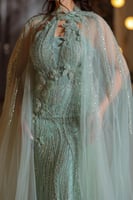 فستان سهره بتطريز كامل وأكمام كيب شفافه