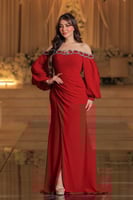 فستان سهرة أحمر ملكي بأكمام منفوخة ولمسات ترصيع فا...