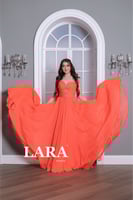 فستان شيفون طويل مزين بكرستالات على الصدر