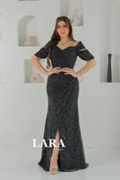 فستان سهرة مرصع بالفصوص اللماعة