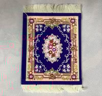 كوستر بشكل سجادة