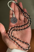 سبحة اسود شفاف( غير قابله للنحت)