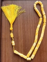 سبحة ترب كهرمان بيروتي إسطوانية شرابة صفراء