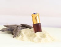 دهن عود تراد