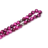 سبحة عين النمر الوردي 33 حبة 10 مم