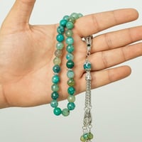 سبحة أحجار من العقيق الثلجي — 33 خرزة (10 مم)