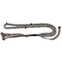 سبحة عظم الجمل أصلية مطعّمة بفضة عيار 925 – 33 خرز...