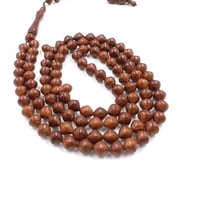 السبحة خشب الكوك بيضاوي 99