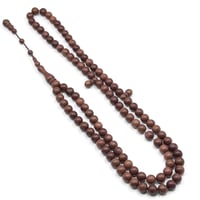 سبح خشب الكوك طبيعي 99 حبة تقسيم 33