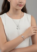 طقم مجوهرات فضي أنيق بتصميم زهري مكون من عقد، سوار...