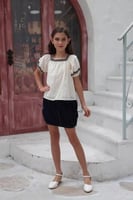 بلوزة بيضة باطراف سودة 7142