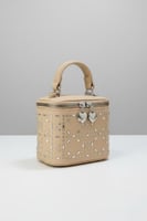 شنطة بناتية أنيقة بلون بيج مزينة بالاكسسوارات B014