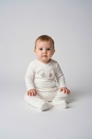 علبة مواليد فاخرة من BabyDola بتصميم الأزهار المطر...