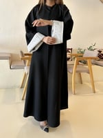 عباية العين ازرار واقف