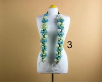 عقد زهرة تخرج بالاسم