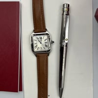ساعة وقلم كارتير