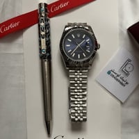 طقم ساعة وقلم