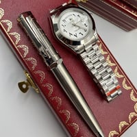 طقم ساعة وقلم