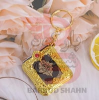 ميدلية مصحف صغير ورقي الون ذهبي فضي اخضر اصفر