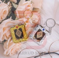 ميدلية مصحف صغير ورقي الون ذهبي فضي اخضر اصفر