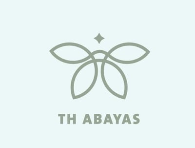 TH.abayas logo
