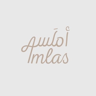 Logo of أَمْلَس | Amlas