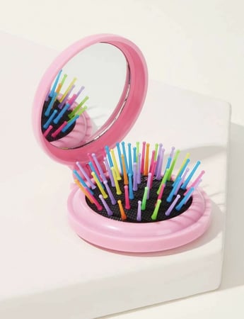 مشط مع مرأه