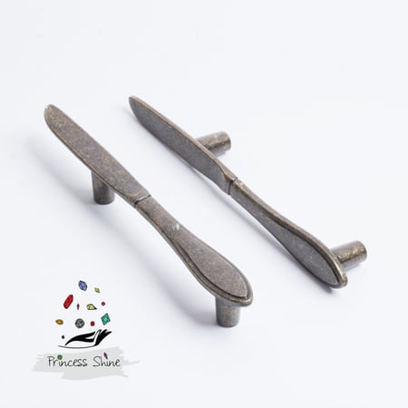 472 - مقبض بشكل سكين لون ( برونز  ) - قطعتين