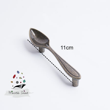 476 - مقبض بشكل ملعقة لون ( برونز ) - قطعتين