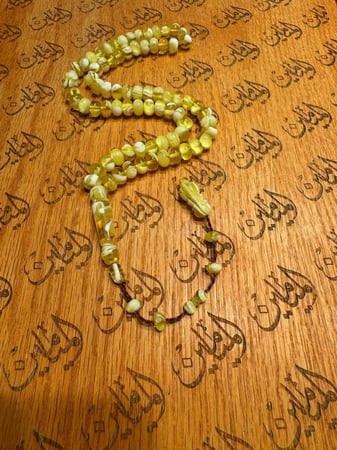 سبحة بكلايت خام امريكي خامة ونظافه قص ذروي 7في11 ملي عدد الخرز 71 خرزة