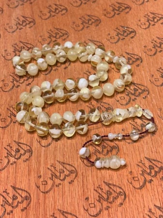 سبحة بكلايت خام امريكي قص ذروي منفوخ خراطة نظيف رنه وصوت وكثافه 14 في 12ملي عدد الخرز 51خرزة