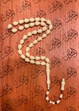 سبحة بكلايت لون سكري قص دمعة خام امريكي خراطة نظيف رنه وصوت وكثافه 12في10ملي عدد الخرز 39