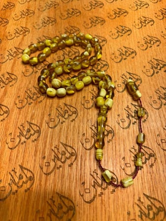 سبحة بكلايت خام امريكي صوت ورنه وكثافه قص صندوقي عدد الخرز55خرزة مقاس 10في12.5ملي