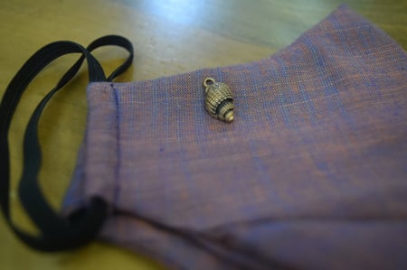 اضافة اكسسوار معدني للكمامة