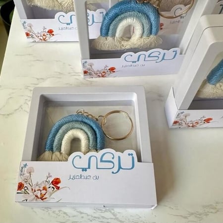 درزن 12 قطعة ميدالية داخل ايطار