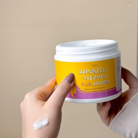 عبوة معالج الشعر رابنزل
