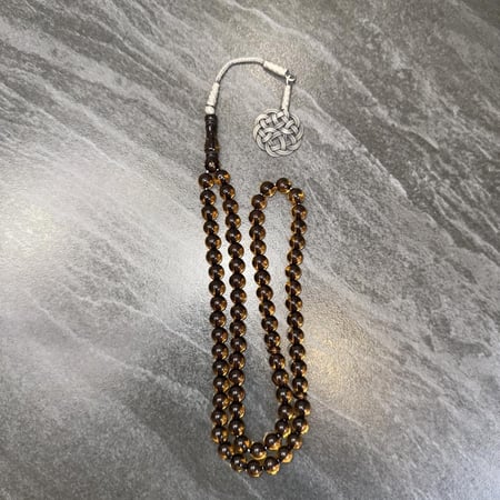 مسباح بكلايت ( عنابي بشفافيه )